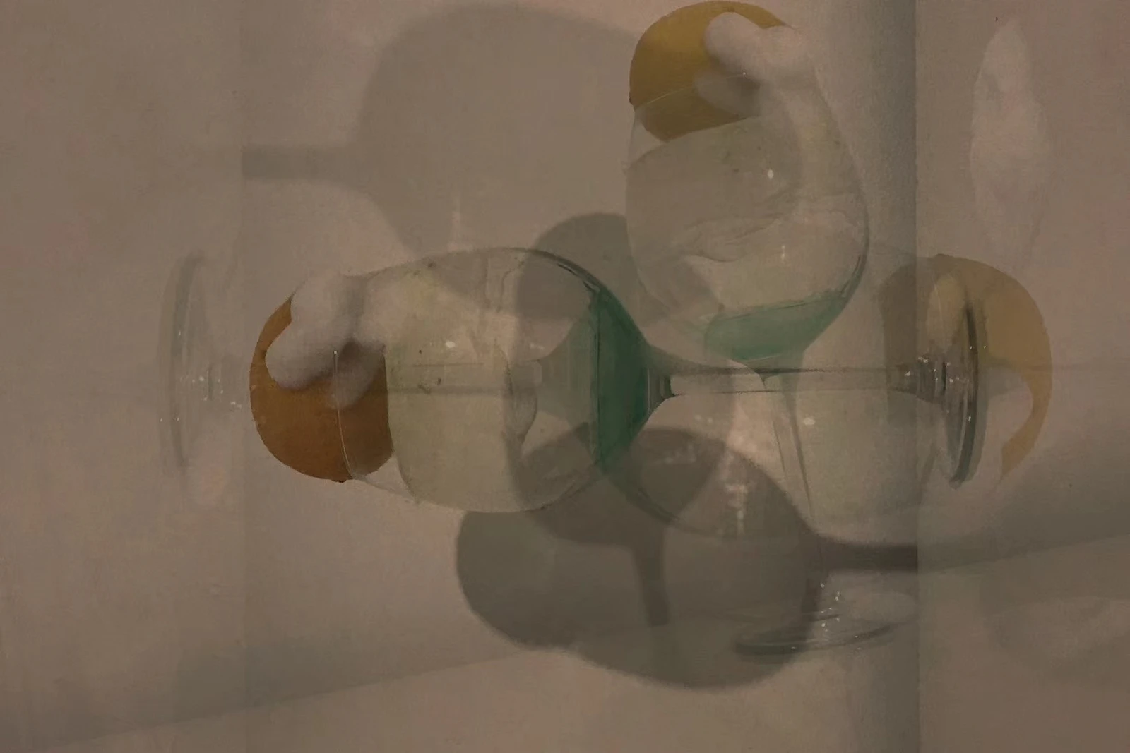 Overlapping translucent forms and colored reflections